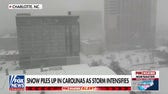 Thousands of US flights disrupted by nor’easter as snow piles up in Carolinas