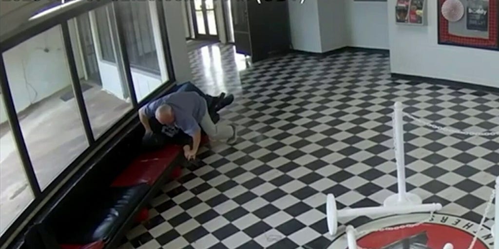 Video shows moment armed ex-student enters Oklahoma school before principal tackles him