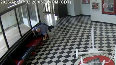 Video shows moment armed ex-student enters Oklahoma school before principal tackles him