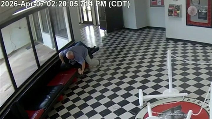 Video shows moment armed ex-student enters Oklahoma school before principal tackles him