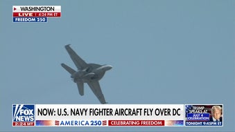US Navy fighter aircraft fly over Washington, DC, in America 250 celebration