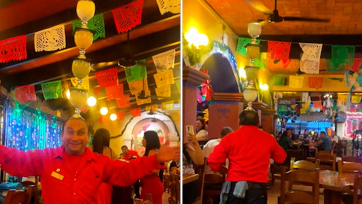 Waiter dances through restaurant balancing 4 frozen margaritas on his head