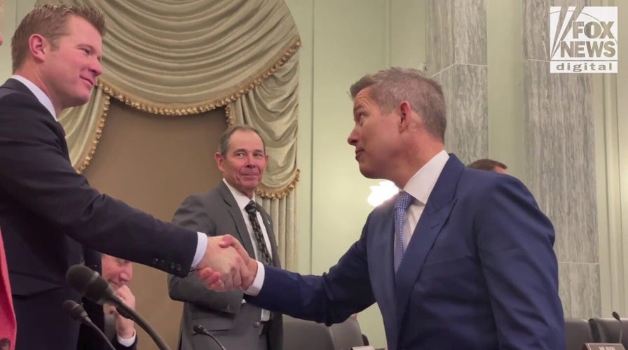 Duffy greets senators before confirmation hearing