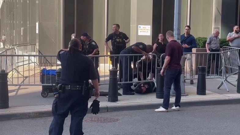 Person taken into custody after incendiary device explodes outside New York federal building