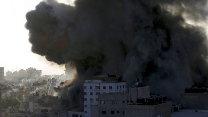 Dozens killed as Israel, Hamas trade rocket fire