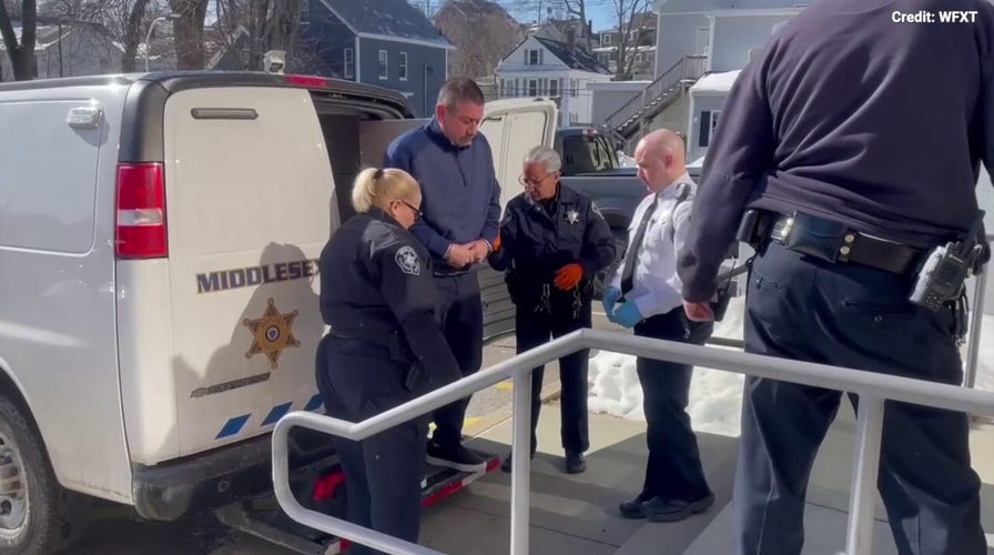 Massachusetts hoops  manager  accused of raping pupil  arrives to court