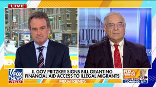 Gov. Pritzker signs bill granting financial aid to illegal migrants