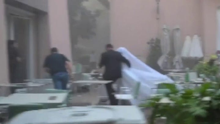 Raw video: Beirut blast interrupts bride's photoshoot