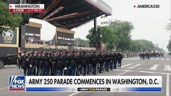 'Army Goes Rolling Along' as Trump salutes troops