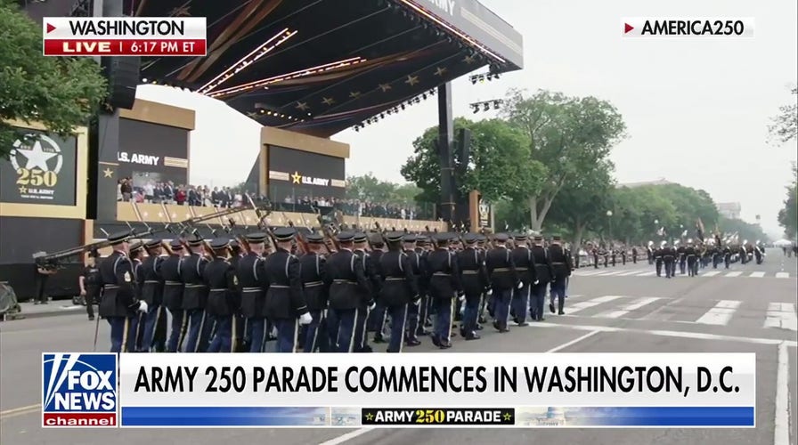 'Army Goes Rolling Along' as Trump salutes troops