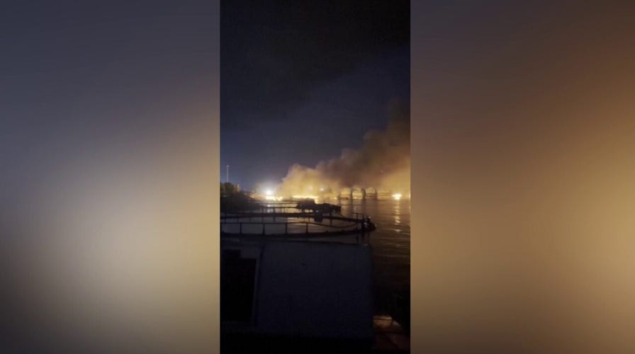 Smoke rises from Iranian port near Strait of Hormuz