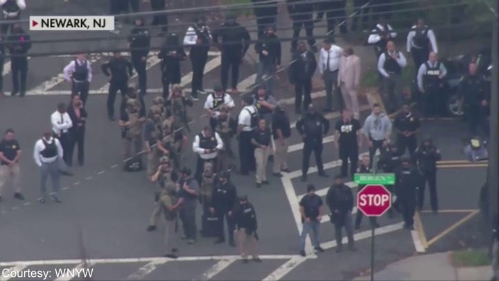 Helicopter footage of police response to multiple officers shot in Newark, New Jersey