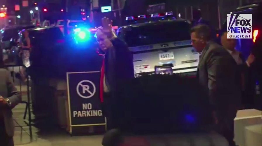 Donald Trump arrives at Trump Tower in New York City after FBI raid