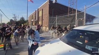 WATCH: ICE protesters thrown to ground by law enforcement as they attempt to block vehicle