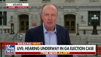 Georgia judge allows 2 Trump defendants to sever from case