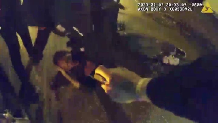 Bodycam footage shows officers standing over injured Tyre Nichols as he screams for help
