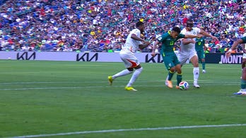 Bolivia's Moises Paniagua finds the net for the equalizer against Suriname