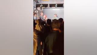 Protester CRASHES data center event as 'USA' chants erupt