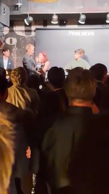 Protester CRASHES data center event as 'USA' chants erupt