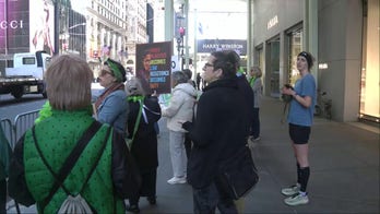 May Day demonstrators march by Trump Tower in NYC, chant anti-ICE slogans