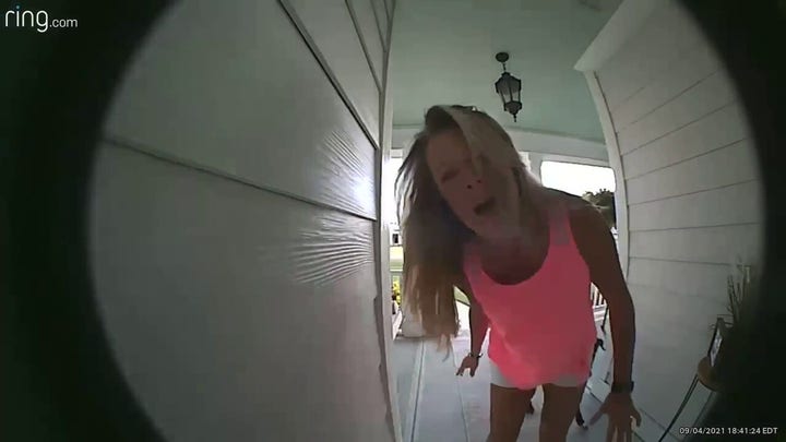 Doorbell video shows neighbors warning couple their porch is on fire