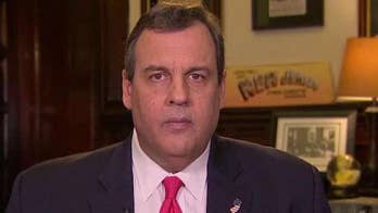 Christie slams Obama's legacy, defends record as governor