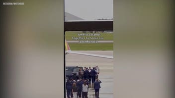 WATCH: Emotional airport tribute unfolds as travelers honor fallen service member