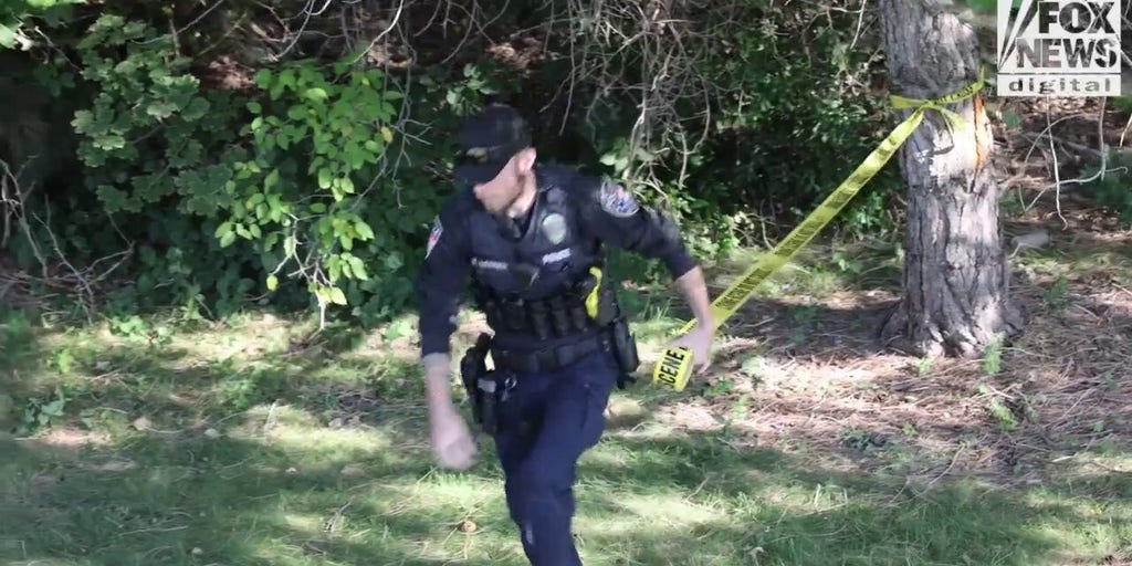 Investigators search for evidence in the Charlie Kirk assassination
