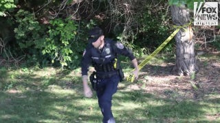 Investigators search for evidence in the Charlie Kirk assassination