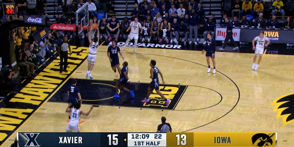 Iowa's Tate Sage cuts up the middle for a two-handed slam vs. Xavier