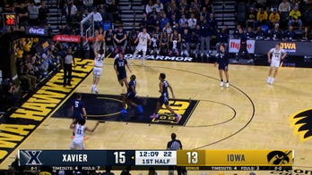Iowa's Tate Sage cuts up the middle for a two-handed slam vs. Xavier