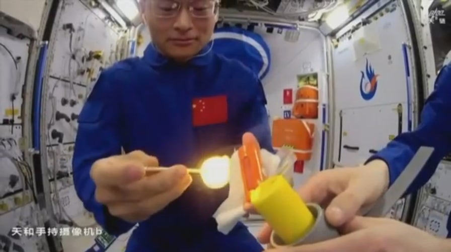Chinese astronauts livestream while lighting open flame in space