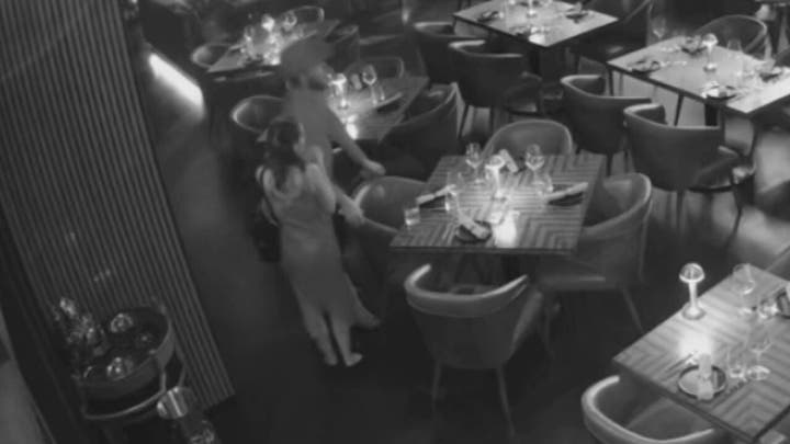 Couple caught on camera allegedly taking $4K bottle at pricey restaurant as questions grow
