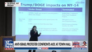 AOC confronted by heckler during town hall - Fox News
