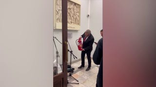 Far-right Polish lawmaker stokes outrage after blasting menorah with fire extinguisher - Fox News