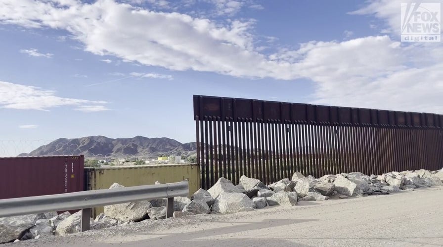 How do Arizona residents feel about the shipping containers blocking the border?