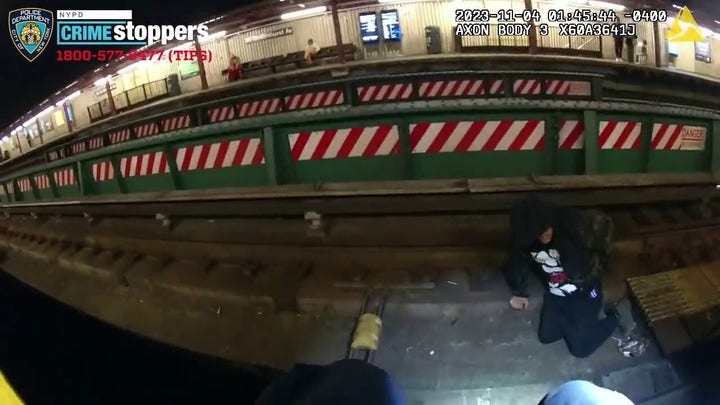 NYPD officers save a straphanger who fell onto subway tracks