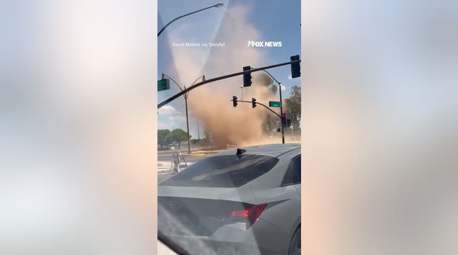 Dust devil barrels through Arizona intersection