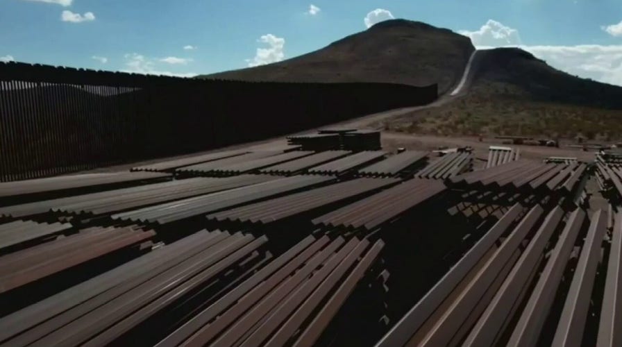 Piles of metal beams sit unused along southern border