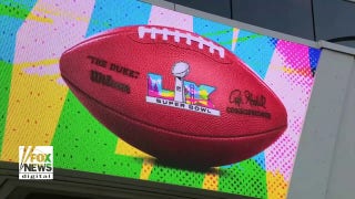 Americans are spending less on the Super Bowl this year