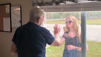 North Carolina woman surprises grandfather by showing her engagement ring through window amid coronavirus concerns