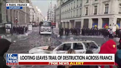 Arrests mount in Paris after half a million take over French streets
