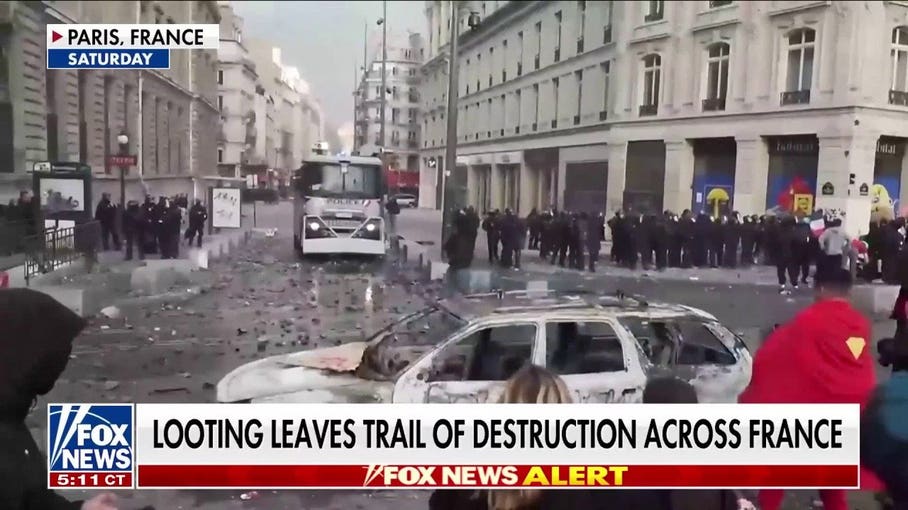 Arrests mount in Paris after half a million take over French streets