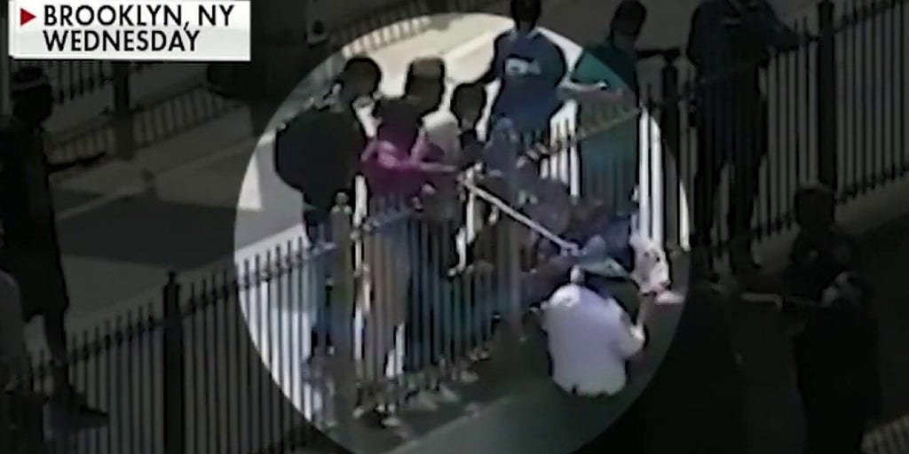 NYPD searching for suspect seen on video hitting officers with