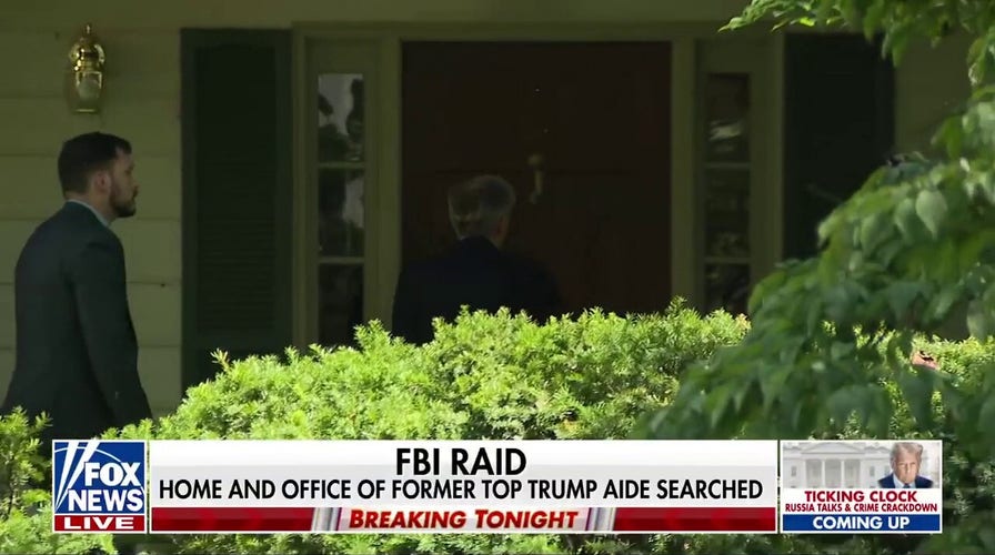 Bolton returns to Maryland home after FBI raid