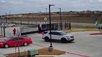 Man seen on video running, firing gun during car repossession