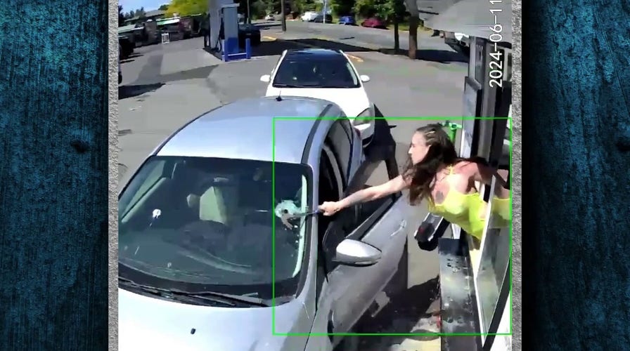 Bikini-clad barista smashes customer's windshield after coffee thrown at her