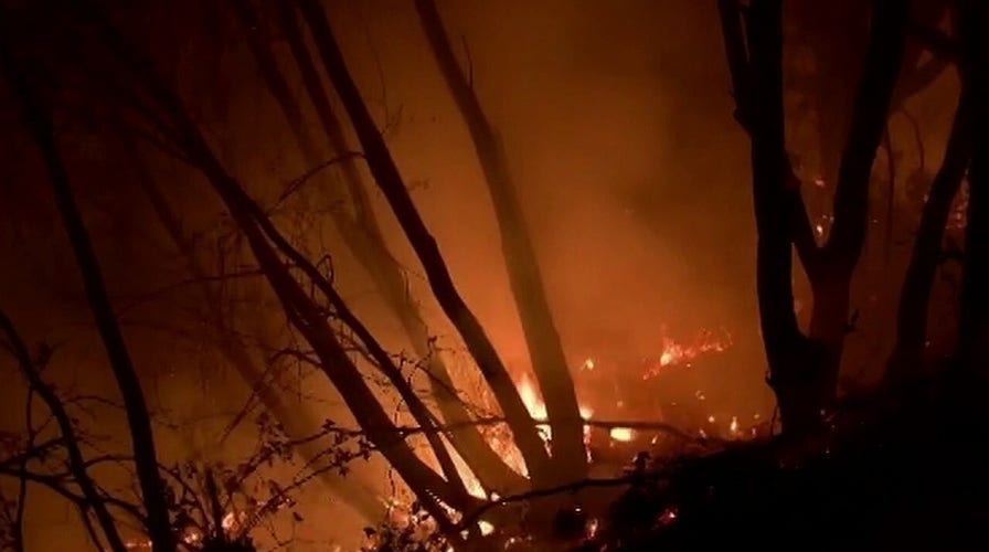 At least 23 dead as wildfires burn West Coast