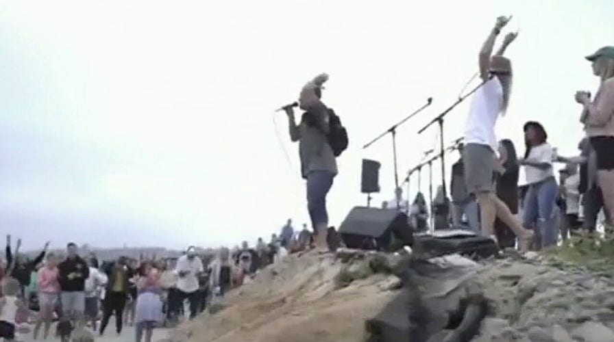 Thousands of Californians attend 'Let Us Worship' beach protests in defiance of state lockdown