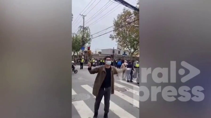 Protester arrested at rally against lockdown in Shanghai, China